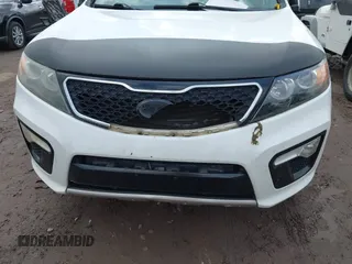 2012 Kia Sorento SX z VIN 5XYKWDA23CG231228, wystawiony jako IAAI lot #42366536 z przebiegiem 154 627 mil mil oraz . Historia ofert i sprzedaży dostępna na DreamBid. Obrazek 6.