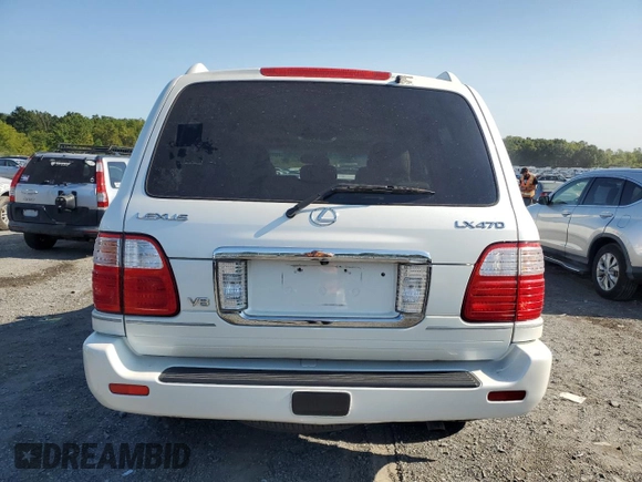 2004 Lexus LX 470 with VIN JTJHT00W243539249, listed as a Copart auction lot 70493974 with 181,155 mi miles and Clean Title. Bid and sale history available at DreamBid. Image 6.