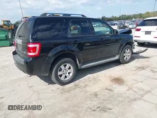 2010 Ford Escape Limited z VIN 1FMCU0EG6AKC04990, wystawiony jako IAAI lot #42206601 z przebiegiem 139 400 mil mil oraz . Historia ofert i sprzedaży dostępna na DreamBid. Obrazek 4.