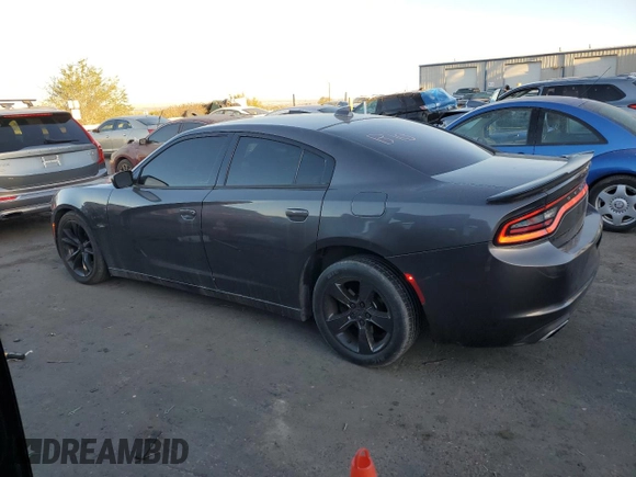 2016 Dodge Charger R/T with VIN 2C3CDXCT1GH283471, listed as a Copart auction lot 75701504 with 127,151 mi miles and Salvage title. Bid and sale history available at DreamBid. Image 2.