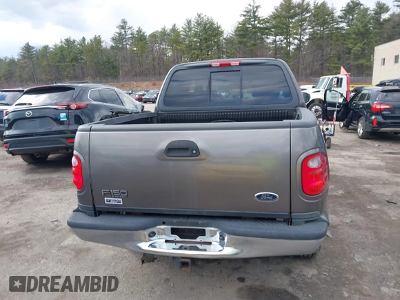 2003 Ford F-150 XLT with VIN 1FTRW08L63KA37275, listed as a IAAI auction lot 41875128 with 133,257 mi miles. Bid and sale history available at carsss.com. Image 16.