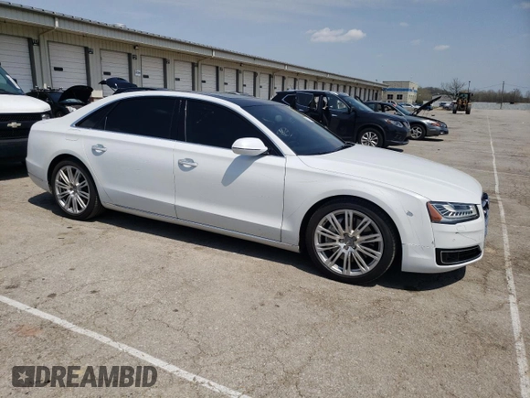 2015 Audi A8 3.0T with VIN WAU3GAFD1FN000655, listed as a Copart auction lot 52792305 with 133,387 mi miles and Salvage Title. Bid and sale history available at DreamBid. Image 4.