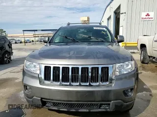 2012 Jeep Grand Cherokee Laredo with VIN 1C4RJEAG1CC306950, listed as a Copart auction lot 84912434 with 128,659 mi miles and Salvage Title. Bid and sale history available at carsss.com. Image 14.
