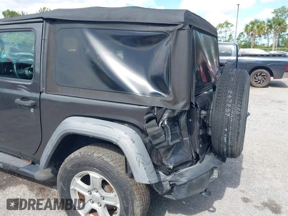 2018 Jeep Wrangler Sport with VIN 1C4GJXAG5JW138437, listed as a IAAI auction lot 42694278 with 58,258 mi miles and . Bid and sale history available at DreamBid. Image 6.