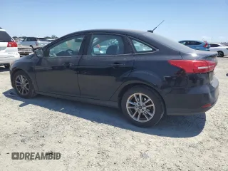 2018 Ford Focus SE with VIN 1FADP3FE8JL205699, listed as a Copart auction lot 63300795 with 128,877 mi miles and Clean title. Bid and sale history available at DreamBid. Image 2.