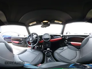 2013 MINI Convertible S z VIN WMWZP3C50DT297624, wystawiony jako IAAI lot #42558374 z przebiegiem 55 106 mil mil oraz . Historia ofert i sprzedaży dostępna na DreamBid. Obrazek 19.