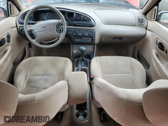 2000 Ford Contour SE Fleet z VIN 1FAFP6636YK142708, wystawiony jako Copart lot #77976124 z przebiegiem 126 879 mil mil oraz Szkody całkowita. Historia ofert i sprzedaży dostępna na DreamBid. Obrazek 8.
