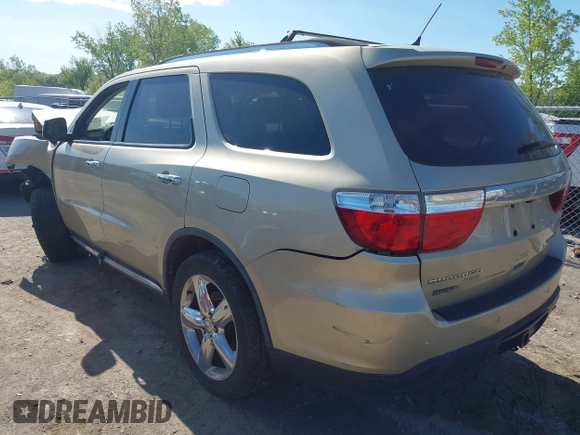2011 Dodge Durango Citadel with VIN 1D4RE5GG3BC599473, listed as a IAAI auction lot 42216934 with 151,418 mi miles and . Bid and sale history available at DreamBid. Image 3.