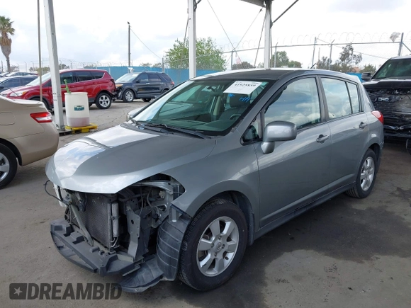 2009 Nissan Versa 1.8 S with VIN 3N1BC13E39L391774, listed as a IAAI auction lot 41925859 with 132,019 mi miles. Bid and sale history available at carsss.com. Image 2.