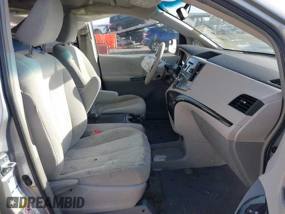 2014 Toyota Sienna LE with VIN 5TDJK3DC4ES088768, listed as a IAAI auction lot 41473251 with 100,512 mi miles and . Bid and sale history available at DreamBid. Image 5.