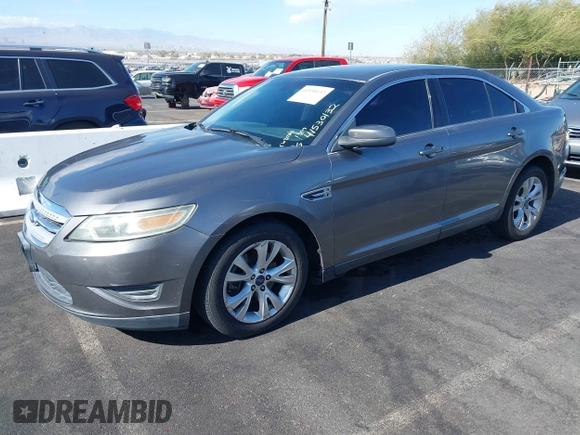 2011 Ford Taurus SEL with VIN 1FAHP2EW9BG158991, listed as a IAAI auction lot 41530132 with 153,323 mi miles. Bid and sale history available at carsss.com. Image 2.