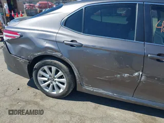 2019 Toyota Camry LE z VIN 4T1B11HK9KU245615, wystawiony jako IAAI lot #42066968 z przebiegiem 130 042 mil mil oraz . Historia ofert i sprzedaży dostępna na DreamBid. Obrazek 12.