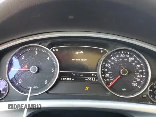 2013 Volkswagen Touareg Sport с VIN WVGEP9BP0DD010408, выставлен на аукционе Copart как лот 75854084 с пробегом 159 863 миль миль и Списание • Salvage title. История ставок и продаж доступна на DreamBid. Изображение 9.