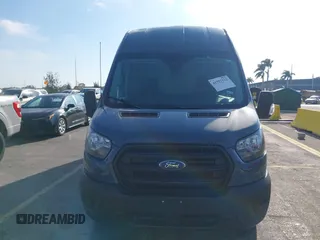 2020 Ford Transit Cargo with VIN 1FTBR3X85LKB04164, listed as a IAAI auction lot 41757122 with 101,038 mi miles. Bid and sale history available at carsss.com. Image 12.
