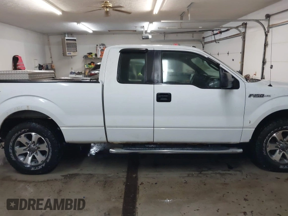 2014 Ford F-150 XL with VIN 1FTEX1CM3EFB15654, listed as a IAAI auction lot 41599447 with 148,481 mi miles and . Bid and sale history available at DreamBid. Image 13.
