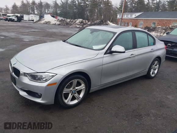 2013 BMW 3 Series 328i xDrive with VIN WBA3B5C58DF594087, listed as a IAAI auction lot 41710362 with 185,994 mi miles. Bid and sale history available at carsss.com. Image 2.