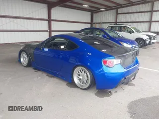 2015 Subaru BRZ Limited with VIN JF1ZCAC1XF8603918, listed as a IAAI auction lot 42296875 with 39,869 mi miles and . Bid and sale history available at DreamBid. Image 3.