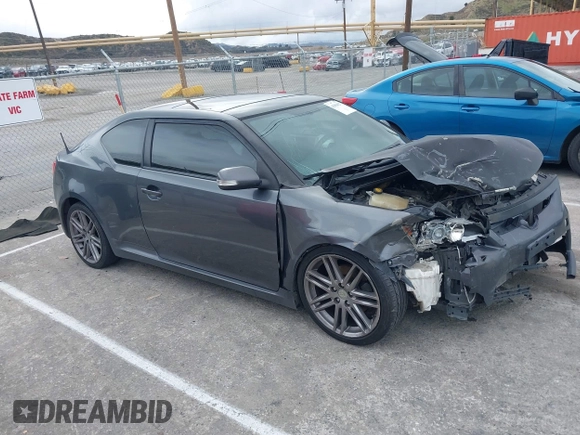 2013 Scion tC with VIN JTKJF5C74D3052964, listed as a IAAI auction lot 41804627 with 244,013 mi miles. Bid and sale history available at carsss.com. Image 1.