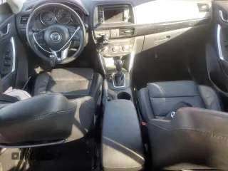 2014 Mazda CX-5 Grand Touring with VIN JM3KE4DY9E0419111, listed as a Copart auction lot 52250315 with 130,003 mi miles and Salvage Title. Bid and sale history available at DreamBid. Image 8.