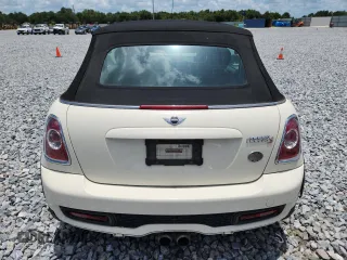 2015 MINI Convertible S с VIN WMWZP3C50F2A91635, выставлен на аукционе Copart как лот 61482285 с пробегом 105 437 миль миль и Списание • Salvage title. История ставок и продаж доступна на DreamBid. Изображение 6.