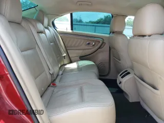 2014 Ford Taurus SEL z VIN 1FAHP2E83EG153033, wystawiony jako Copart lot #55400835 z przebiegiem 96 612 mil mil oraz Szkoda całkowita • Salvage title. Historia ofert i sprzedaży dostępna na DreamBid. Obrazek 10.