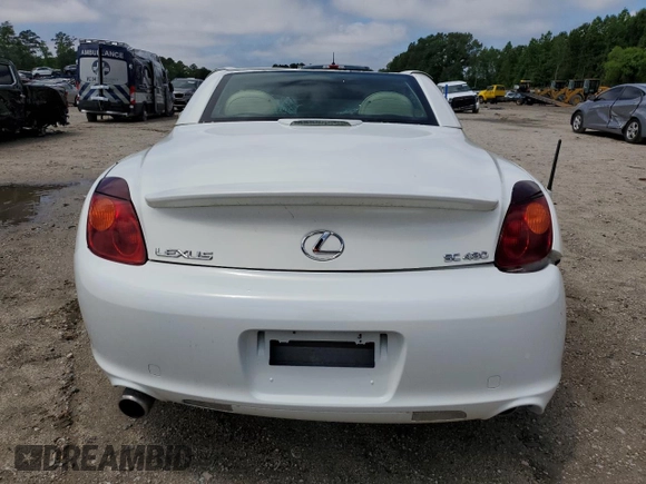 2003 Lexus SC 430 z VIN JTHFN48Y730038082, wystawiony jako Copart lot #52608085 z przebiegiem 133 491 mil mil oraz Szkody całkowita. Historia ofert i sprzedaży dostępna na DreamBid. Obrazek 6.