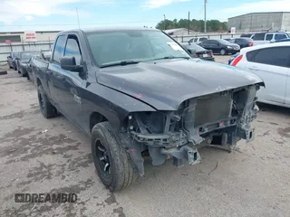 2020 Ram 1500 Classic Tradesman with VIN 1C6RR6FG0LS114553, listed as a IAAI auction lot 41293058 with 143,353 mi miles. Bid and sale history available at carsss.com. Image 1.