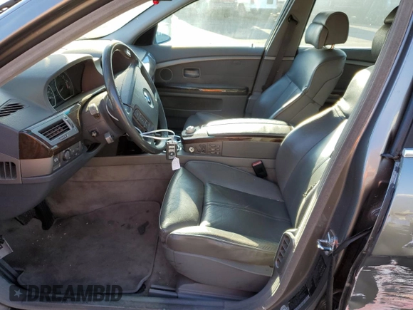 2002 BMW 7 Series 745i with VIN WBAGL63462DP57016, listed as a Copart auction lot 81025594 with 121,870 mi miles and Salvage Title. Bid and sale history available at DreamBid. Image 7.
