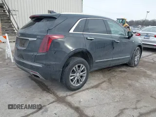 2021 Cadillac XT5 AWD Premium Luxury with VIN 1GYKNDRS7MZ168493, listed as a IAAI auction lot 41395162 with 33,064 mi miles. Bid and sale history available at carsss.com. Image 4.