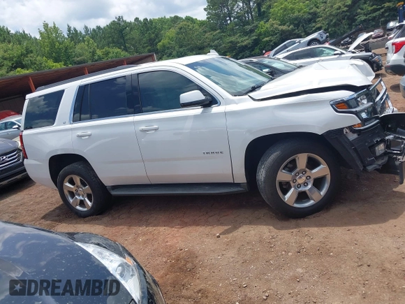 2016 Chevrolet Tahoe LT with VIN 1GNSCBKC9GR459057, listed as a IAAI auction lot 42541097 with 82,203 mi miles and . Bid and sale history available at DreamBid. Image 12.