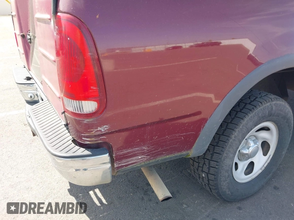 1998 Ford F-150 with VIN 1FTZF182XWKA36602, listed as a IAAI auction lot 42472442 with 112,235 mi miles and . Bid and sale history available at DreamBid. Image 6.