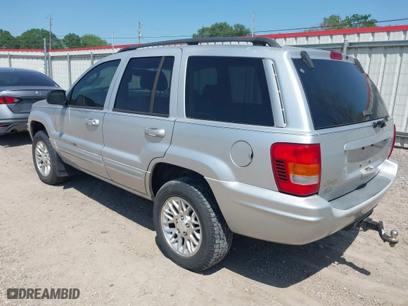 2002 Jeep Grand Cherokee Limited with VIN 1J8GW58S62C253818, listed as a IAAI auction lot 41983592 with 165,378 mi miles. Bid and sale history available at carsss.com. Image 3.