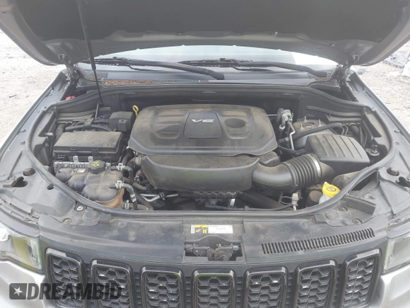 2018 Jeep Grand Cherokee Laredo E z VIN 1C4RJEAG5JC404022, wystawiony jako IAAI lot #42586412 z przebiegiem 95 798 mil mil oraz . Historia ofert i sprzedaży dostępna na DreamBid. Obrazek 10.