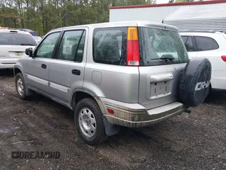 2001 Honda CR-V LX with VIN JHLRD28441C000682, listed as a IAAI auction lot 42019317 with 214,884 mi miles. Bid and sale history available at carsss.com. Image 3.