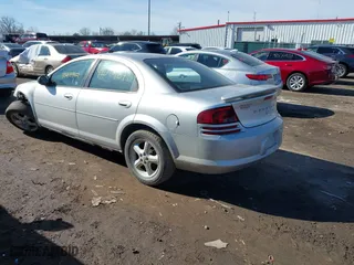 2004 Dodge Stratus SXT with VIN 1B3EL46X64N128617, listed as a IAAI auction lot 41584871 with 140,316 mi miles. Bid and sale history available at carsss.com. Image 3.