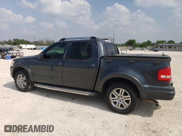 2010 Ford Explorer Sport Trac Limited with VIN 1FMEU3DE4AUA26558, listed as a Copart auction lot 52166345 with 127,441 mi miles and Clean title. Bid and sale history available at DreamBid. Image 2.