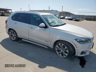 2017 BMW X5 xDrive50i with VIN 5UXKR6C32H0U13460, listed as a Copart auction lot 51462745 with 97,749 mi miles and Salvage title. Bid and sale history available at DreamBid. Image 4.
