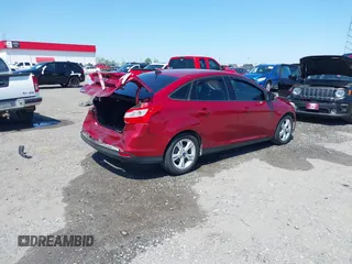 2014 Ford Focus SE with VIN 1FADP3F22EL171416, listed as a IAAI auction lot 41982150 with 130,782 mi miles. Bid and sale history available at carsss.com. Image 4.
