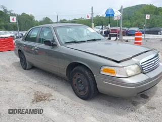 2003 Ford Crown Victoria Standard z VIN 2FAFP73WX3X182848, wystawiony jako IAAI lot #42438856 z przebiegiem 169 707 mil mil oraz . Historia ofert i sprzedaży dostępna na DreamBid. Obrazek 1.