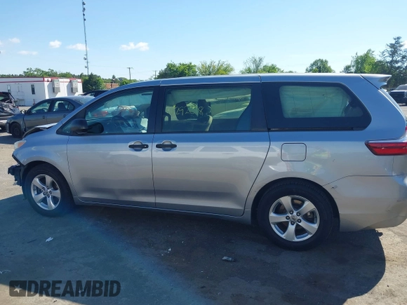 2015 Toyota Sienna L with VIN 5TDZK3DCXFS594786, listed as a IAAI auction lot 42292618 with 180,119 mi miles and . Bid and sale history available at DreamBid. Image 14.