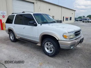 2000 Ford Explorer Eddie Bauer z VIN 1FMDU64E5YZB10754, wystawiony jako IAAI lot #42410468 z przebiegiem 209 690 mil mil oraz . Historia ofert i sprzedaży dostępna na DreamBid. Obrazek 1.