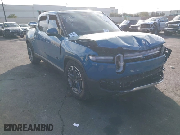 2025 Rivian R1T Adventure z VIN 7FCTGBAA9SN035986, wystawiony jako IAAI lot #41510257 z przebiegiem 2 102 mil mil oraz . Historia ofert i sprzedaży dostępna na DreamBid. Obrazek 1.