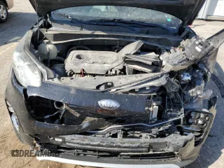 2018 Kia Sportage EX z VIN KNDPN3AC8J7450904, wystawiony jako Copart lot #76091074 z przebiegiem 104 850 mil mil oraz Szkoda całkowita • Salvage title. Historia ofert i sprzedaży dostępna na DreamBid. Obrazek 12.