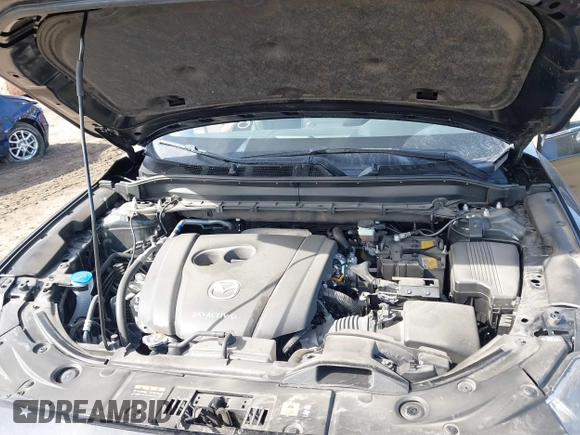 2023 Mazda CX-5 S Premium with VIN JM3KFBDM7P0201038, listed as a IAAI auction lot 41772989 with 26,227 mi miles and . Bid and sale history available at DreamBid. Image 10.