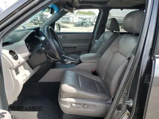 2012 Honda Pilot Touring with VIN 5FNYF4H96CB085752, listed as a Copart auction lot 51292515 with 190,383 mi miles and Salvage Title. Bid and sale history available at DreamBid. Image 7.
