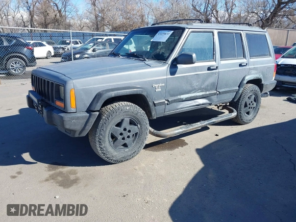 1997 Jeep Cherokee Sport with VIN 1J4FJ68S4VL567490, listed as a IAAI auction lot 41659872 with 404,766 mi miles. Bid and sale history available at carsss.com. Image 2.