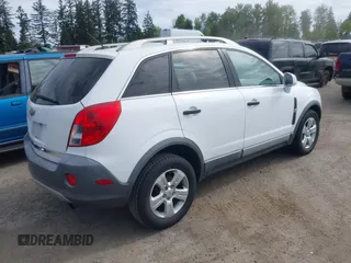 2014 Chevrolet Captiva Sport LS z VIN 3GNAL2EK7ES547033, wystawiony jako IAAI lot #42206186 z przebiegiem 196 530 mil mil oraz . Historia ofert i sprzedaży dostępna na DreamBid. Obrazek 4.