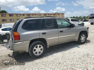 2006 GMC Envoy SLE z VIN 1GKDT13S262271445, wystawiony jako Copart lot #58196195 z przebiegiem 129 902 mil mil oraz Szkoda całkowita • Salvage title. Historia ofert i sprzedaży dostępna na DreamBid. Obrazek 3.