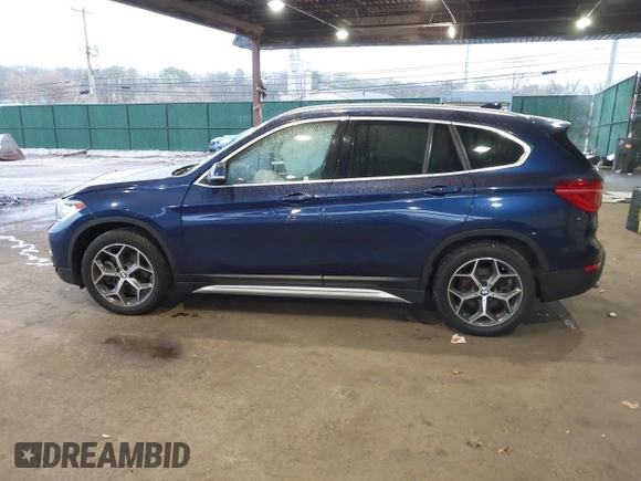 2019 BMW X1 xDrive28i with VIN WBXHT3C55K5L37338, listed as a IAAI auction lot 41934461 with 87,913 mi miles. Bid and sale history available at carsss.com. Image 14.