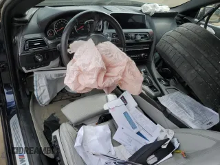 2016 BMW M6 z VIN WBS6G9C5XGD932039, wystawiony jako Copart lot #47433685 z przebiegiem 66 836 mil mil oraz Szkoda całkowita • Salvage title. Historia ofert i sprzedaży dostępna na DreamBid. Obrazek 8.